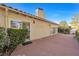 House exterior with access to the backyard patio at 1901 Calle De Espana, Las Vegas, NV 89102