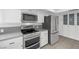 Stainless steel appliances and white cabinets in this kitchen at 1901 Calle De Espana, Las Vegas, NV 89102