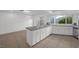 Spacious kitchen with island and gray countertops at 1901 Calle De Espana, Las Vegas, NV 89102