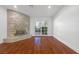 Living room with stone fireplace and hardwood floors at 1901 Calle De Espana, Las Vegas, NV 89102