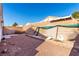 Backyard with gravel, a small garden area, and a block wall at 2204 Kendall Hill Ave, Las Vegas, NV 89106