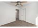 Bedroom with ceiling fan and access to bathroom at 2204 Kendall Hill Ave, Las Vegas, NV 89106