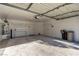 Spacious garage with storage and water softener at 2204 Kendall Hill Ave, Las Vegas, NV 89106