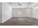 Spacious living room with a window and ceiling fan at 2204 Kendall Hill Ave, Las Vegas, NV 89106