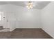 Bright living room featuring neutral walls and carpet at 2204 Kendall Hill Ave, Las Vegas, NV 89106