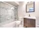 Modern bathroom with bathtub, shower and vanity at 2360 Pickwick Dr, Henderson, NV 89014