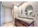 Bathroom boasts a double vanity and granite countertop at 2360 Pickwick Dr, Henderson, NV 89014