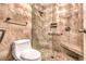 Bathroom with walk-in shower and tiled walls at 2360 Pickwick Dr, Henderson, NV 89014