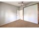 Bedroom with sliding door closet and ceiling fan at 2360 Pickwick Dr, Henderson, NV 89014