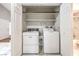 Laundry closet with washer and dryer, and shelving at 2360 Pickwick Dr, Henderson, NV 89014