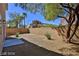 Spacious backyard with gravel and mature trees at 2892 Rothesay Ave, Henderson, NV 89044