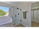 Clean bathroom with a walk-in shower, soaking tub, and modern finishes at 2892 Rothesay Ave, Henderson, NV 89044