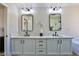 Elegant bathroom featuring a double vanity and modern fixtures at 2892 Rothesay Ave, Henderson, NV 89044