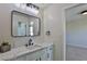 Simple bathroom with single vanity, modern mirror, and fixtures at 2892 Rothesay Ave, Henderson, NV 89044