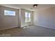 Bright bedroom with a large window and neutral walls at 2892 Rothesay Ave, Henderson, NV 89044