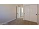 Charming bedroom with sliding closet doors and window at 2892 Rothesay Ave, Henderson, NV 89044