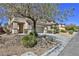 Two-story house exterior with driveway and landscaping at 2892 Rothesay Ave, Henderson, NV 89044