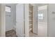 Bathroom with linen closet and access to bedroom at 3655 Funston Way, Las Vegas, NV 89129