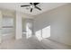 Bedroom with mirrored closet doors and wood-look floors at 3655 Funston Way, Las Vegas, NV 89129