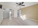 Bedroom with mirrored closet doors and ceiling fan at 3655 Funston Way, Las Vegas, NV 89129