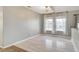 Simple dining room with light walls and wood-look flooring at 3655 Funston Way, Las Vegas, NV 89129