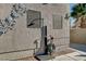 Exterior with decorative shower and wall art at 3655 Funston Way, Las Vegas, NV 89129