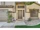 Inviting front door entrance with landscaping and a welcoming mat at 3655 Funston Way, Las Vegas, NV 89129