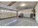 Garage with overhead storage and a security gate at 3655 Funston Way, Las Vegas, NV 89129