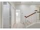 Bright hallway with light wood floors and white doors at 3655 Funston Way, Las Vegas, NV 89129