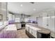 Modern kitchen featuring granite island and updated cabinetry at 3655 Funston Way, Las Vegas, NV 89129