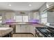 Modern kitchen with stainless steel appliances and granite countertops at 3655 Funston Way, Las Vegas, NV 89129