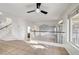 Bright living room with tile flooring and a view to kitchen at 3655 Funston Way, Las Vegas, NV 89129