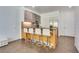 Sleek kitchen island with bar stools and modern cabinets at 3726 Las Vegas Blvd # 2310, Las Vegas, NV 89158