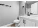 Clean bathroom with white vanity and black accents at 375 Kensington Palace Ave # 3, North Las Vegas, NV 89032