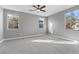 Bright and spacious bedroom with carpet and ceiling fan at 375 Kensington Palace Ave # 3, North Las Vegas, NV 89032