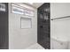 Updated bathroom with black and white tile shower at 3875 Sebasco Dr, Las Vegas, NV 89147