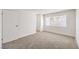 Spacious bedroom with neutral carpeting and ample closet space at 3875 Sebasco Dr, Las Vegas, NV 89147