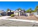 Cute ranch-style home with a well-maintained front yard and attached garage at 3875 Sebasco Dr, Las Vegas, NV 89147