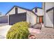 House exterior showcasing a walkway to the front door and a well-maintained yard at 3875 Sebasco Dr, Las Vegas, NV 89147