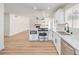 Modern kitchen with white cabinets and stainless steel appliances at 3875 Sebasco Dr, Las Vegas, NV 89147