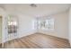 Bright living room featuring hardwood floors and large windows at 3875 Sebasco Dr, Las Vegas, NV 89147