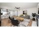 Bright living room with fireplace and view into kitchen at 3875 Sebasco Dr, Las Vegas, NV 89147