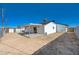 Backyard with covered patio and sandy area at 4173 Crater St, Las Vegas, NV 89122