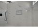 Large walk-in shower with marble tile and rainfall shower head at 4173 Crater St, Las Vegas, NV 89122