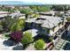 Grand home boasts an impressive tile roof and lush landscaping, as seen in this captivating aerial shot at 4450 Palisades Canyon Cir, Las Vegas, NV 89129