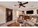Finished basement includes a wet bar, media area, and comfortable armchairs, ideal for relaxing at 4450 Palisades Canyon Cir, Las Vegas, NV 89129