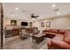 Finished basement features comfortable seating, custom cabinets, and a wet bar for entertaining at 4450 Palisades Canyon Cir, Las Vegas, NV 89129