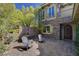 Relaxing courtyard with fountain, stone patio, and comfortable seating at 4450 Palisades Canyon Cir, Las Vegas, NV 89129