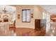 Entryway with wood floors flows into adjacent areas, showcasing the home's open layout at 4450 Palisades Canyon Cir, Las Vegas, NV 89129