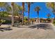 Gated community entrance with brick pavers and palm trees at 4450 Palisades Canyon Cir, Las Vegas, NV 89129